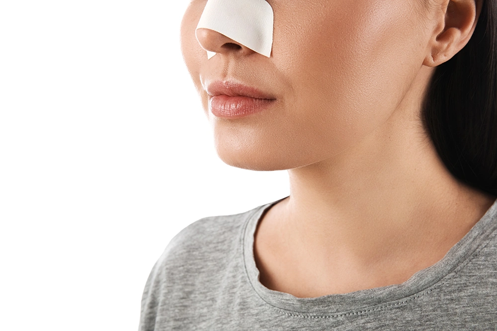 A woman recovering after reconstructive surgery