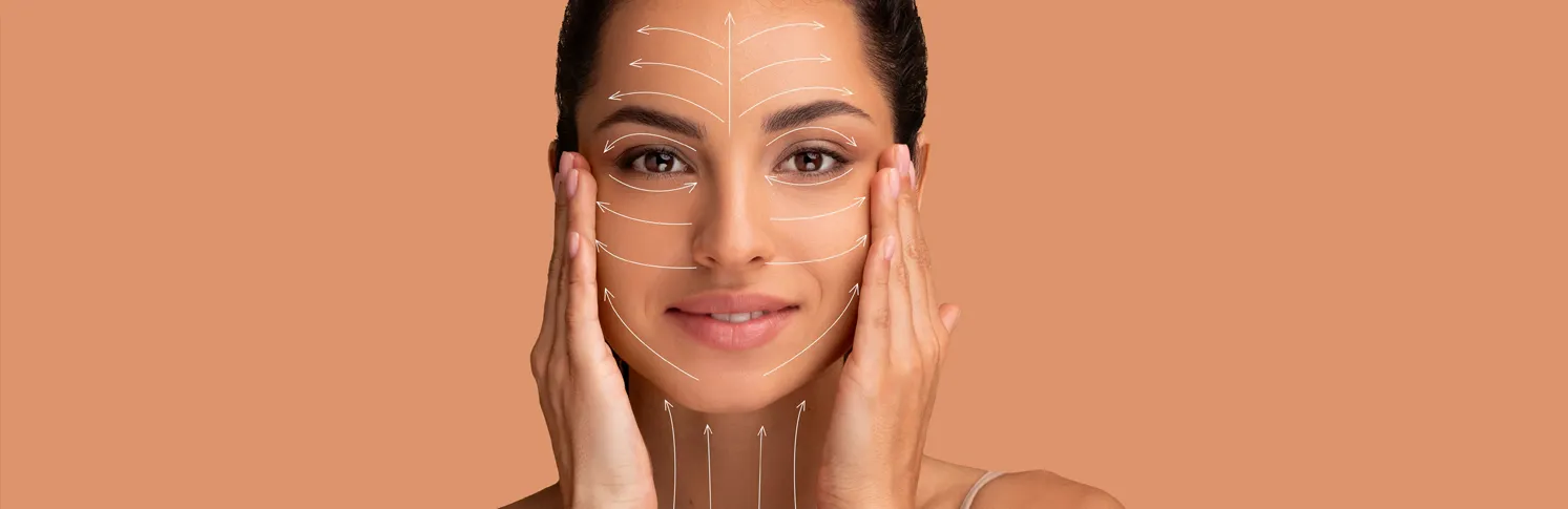 A plastic surgeon discussing different aspects of plastic surgery with a patient.