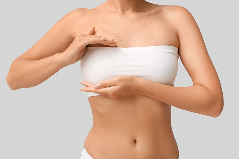 Woman after breast reduction surgery